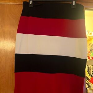 Skirt, multi color, red black n white. Stretchy material . Worn once